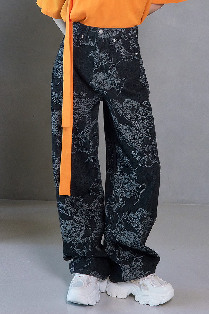 Black wash denim pants with dragon print from TM3, featuring a stylish and trendy design for casual wear.