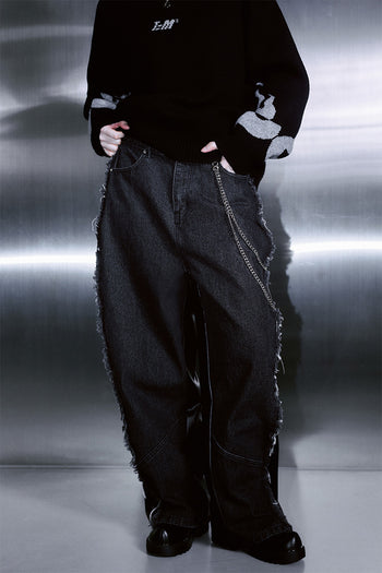 Black denim leather pants by TM3, wide unbalanced design, featuring flame details, unisex style, perfect for edgy fashion statements.