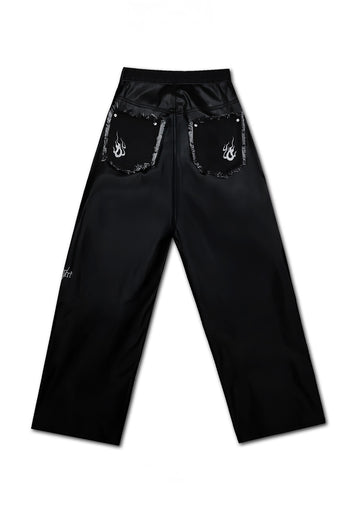 TM3 Dokkaebi Flame unbalanced wide black denim leather pants for men and women, featuring a bold flame design and oversized fit.