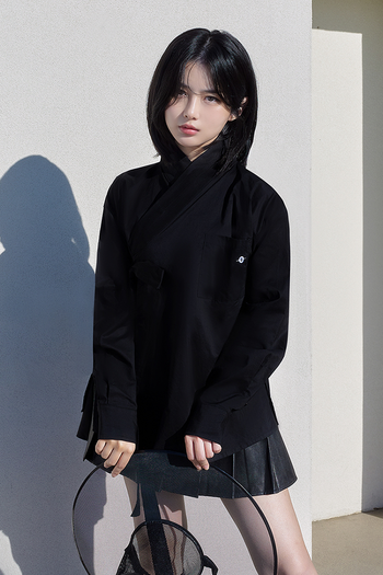 Black TM3 classic Hanbok shirt featuring a traditional design with a round neckline and long sleeves.
