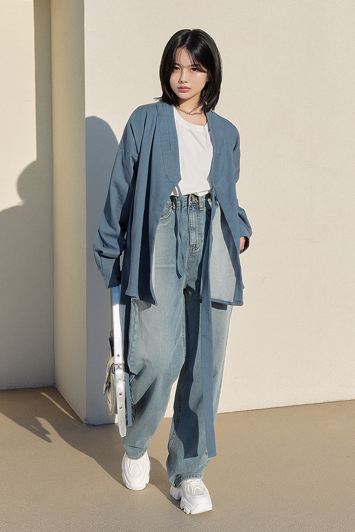 Light denim shirt jacket by TM3, casual button-up shirt with classic denim texture and collar, displayed on a plain background.