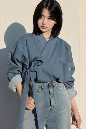 Light blue TM3 denim shirt jacket, casual shirt jacket with button-front and collar, displayed on a plain background.