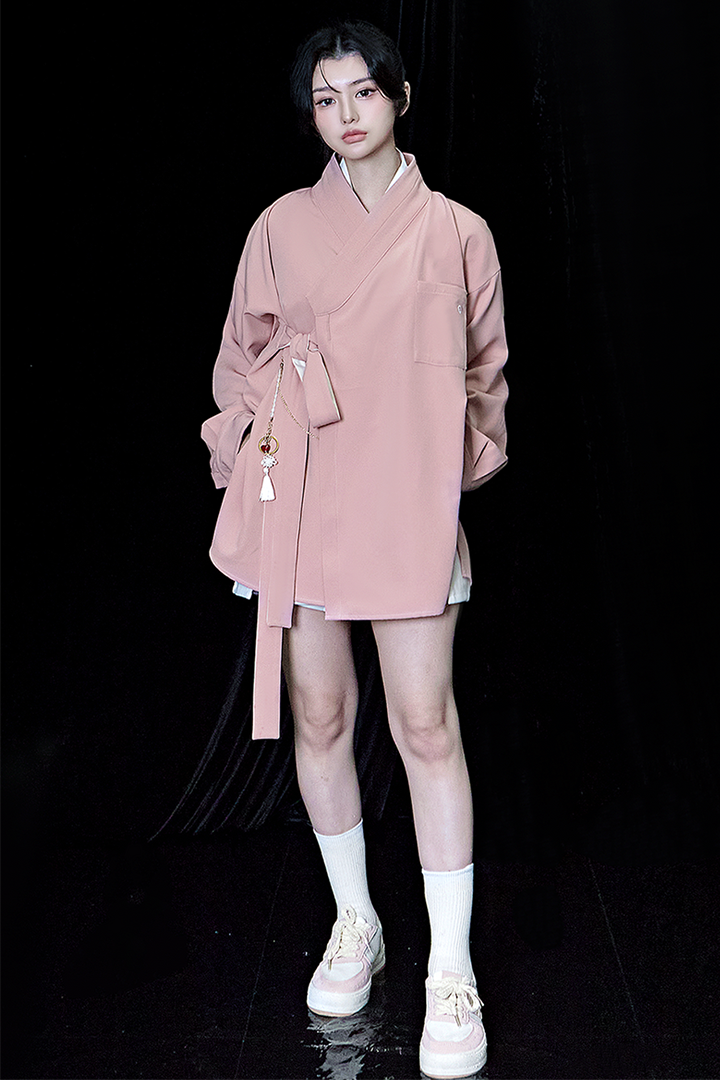 Pink oversized shirt from TM3, casual fit with long sleeves and a relaxed style, shown laid flat.