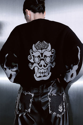 Black TM3 traditional Korean Dokkaebi face merino wool knit sweater, close-up of detailed face embroidery on the front.