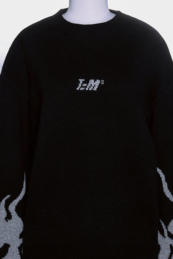 Black TM3 traditional Korean Dokkaebi face merino wool knit sweater, featuring detailed embroidery on the front.