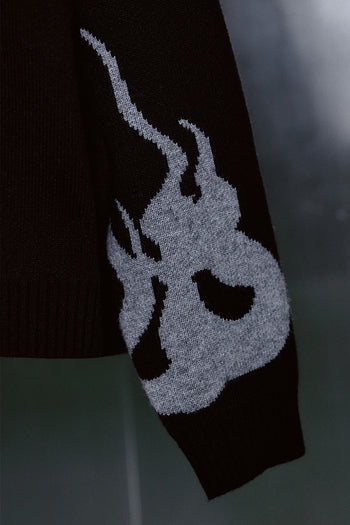 Black TM3 traditional Korean Dokkaebi face Merino wool knit sweater showing detailed knit pattern and facial design.