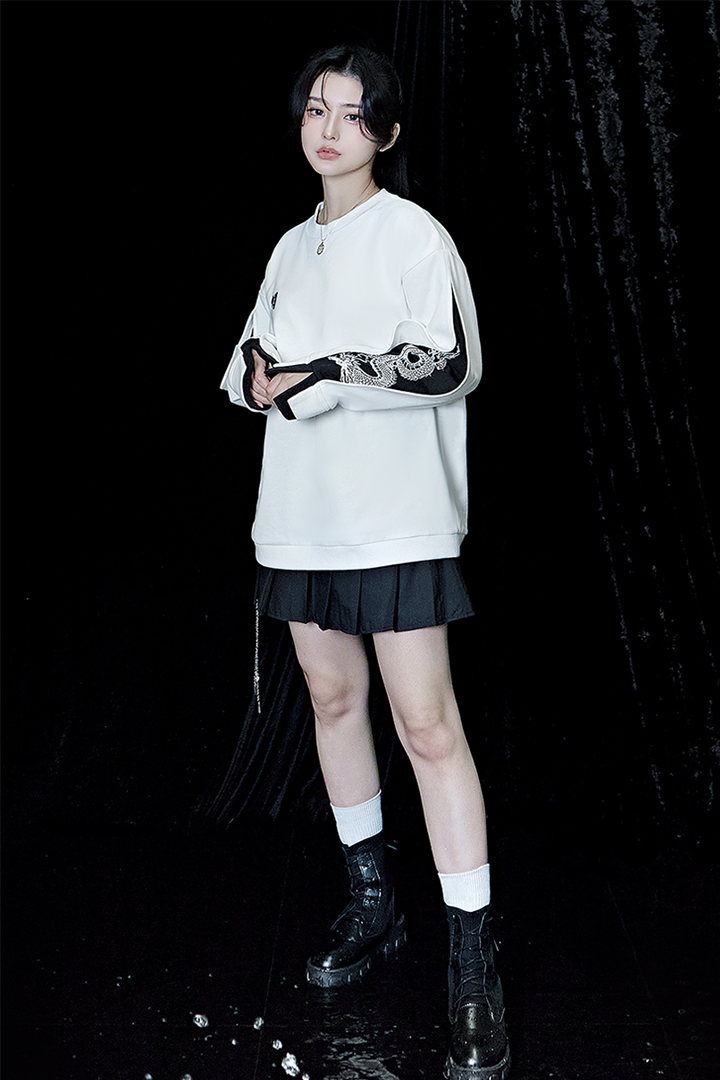 White TM3 Han Secret Black Dragon sweatshirt featuring a black dragon design on the front. Comfortable and stylish casual wear.