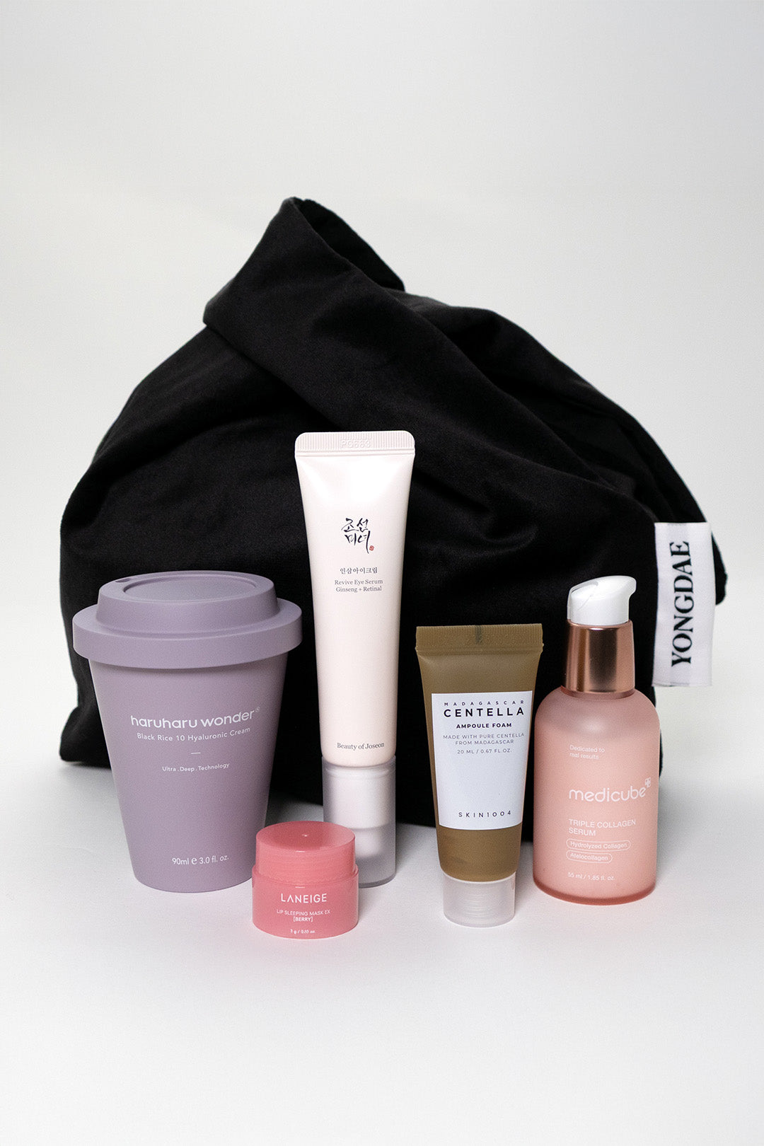Black YONGDAE K-Beauty fashion bag with sleek design, featuring the brand logo and stylish appearance for everyday use.
