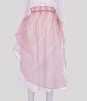 Pink Charlock No-Bang see-through skirt by YONGDAE, lightweight and stylish with a transparent design, shown on a model.